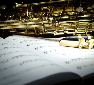 Saxophone on Music Sheet 