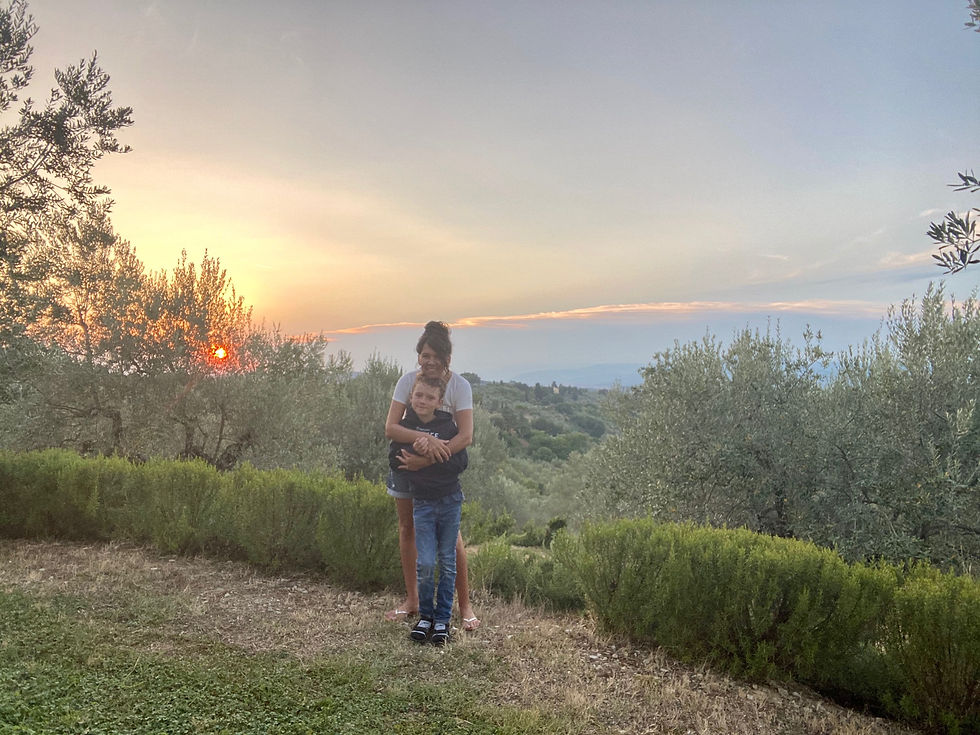 American family happy in Florence, Italy at sunset