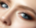 Close up view of blue woman eye with bea