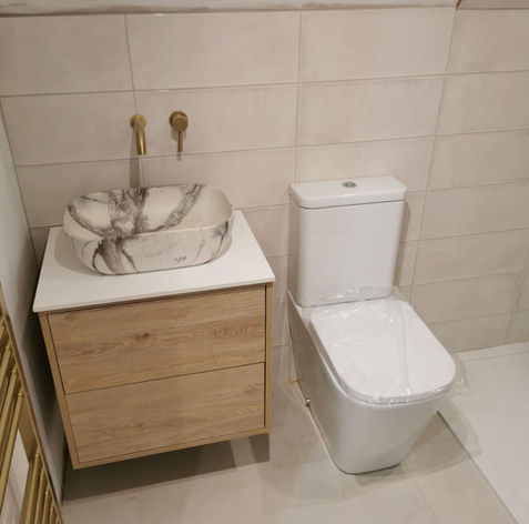 Compact toilet and sink