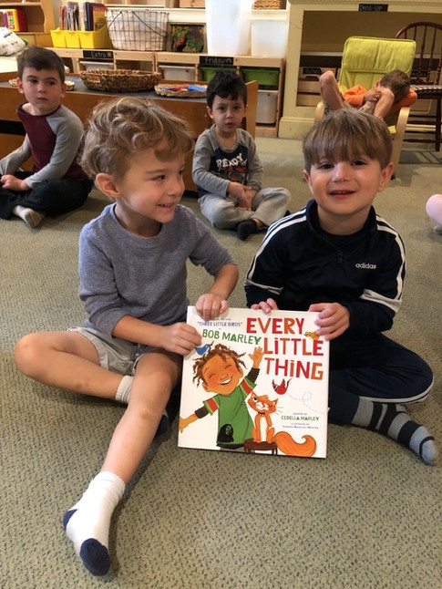 boys sharing a book cks