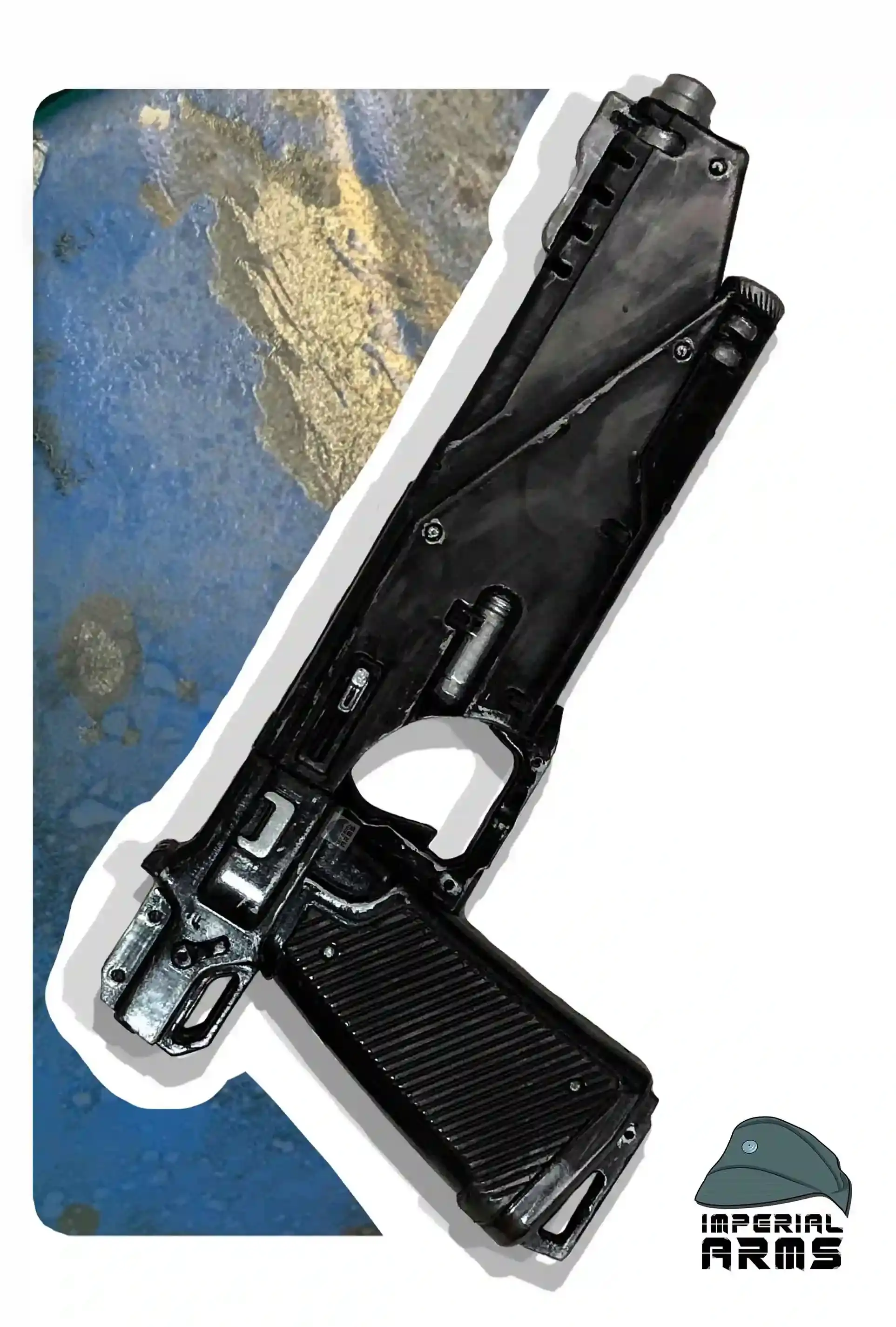 Angled view of Westar-35 Bo-Katan replica rifle prop with blue backdrop and Mythosaur emblem