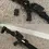 Thumbnail: Disassembled view showing ammo clip removed and laid next to the blaster on the floor