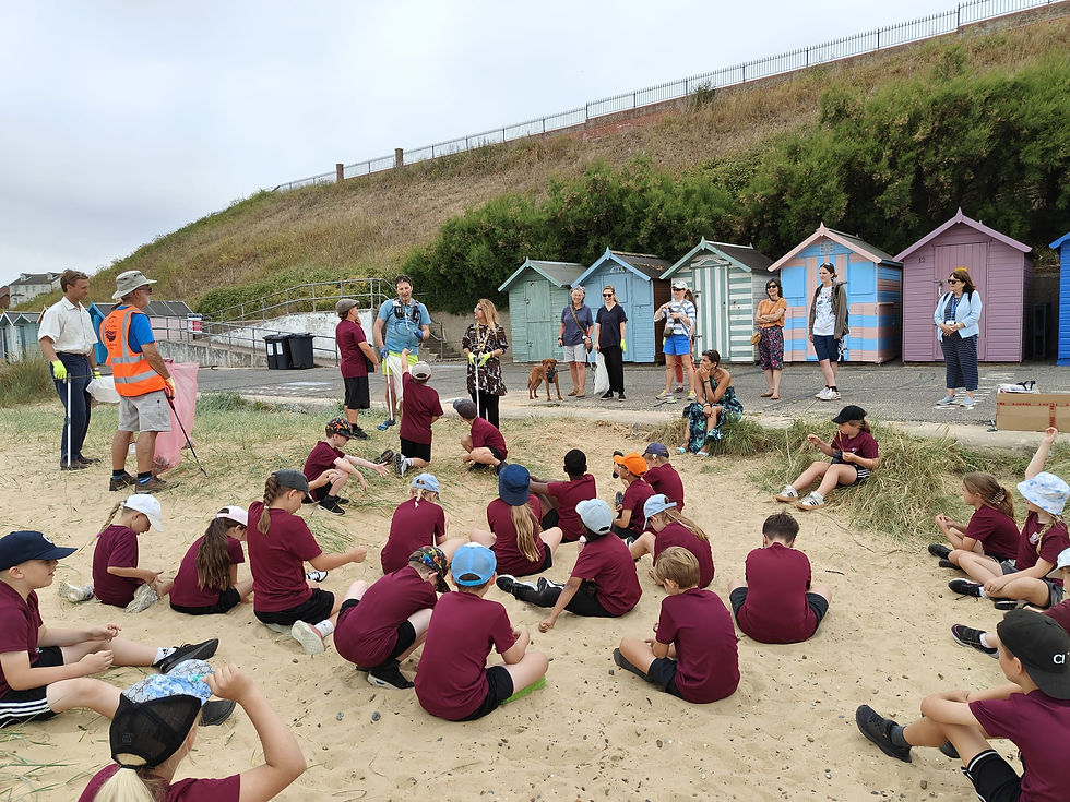 Luke Douglas-Home (aka The Coastline Runner) with Mayor Nasima Begum and talking to pupils from St. Mary’s RC Primary School