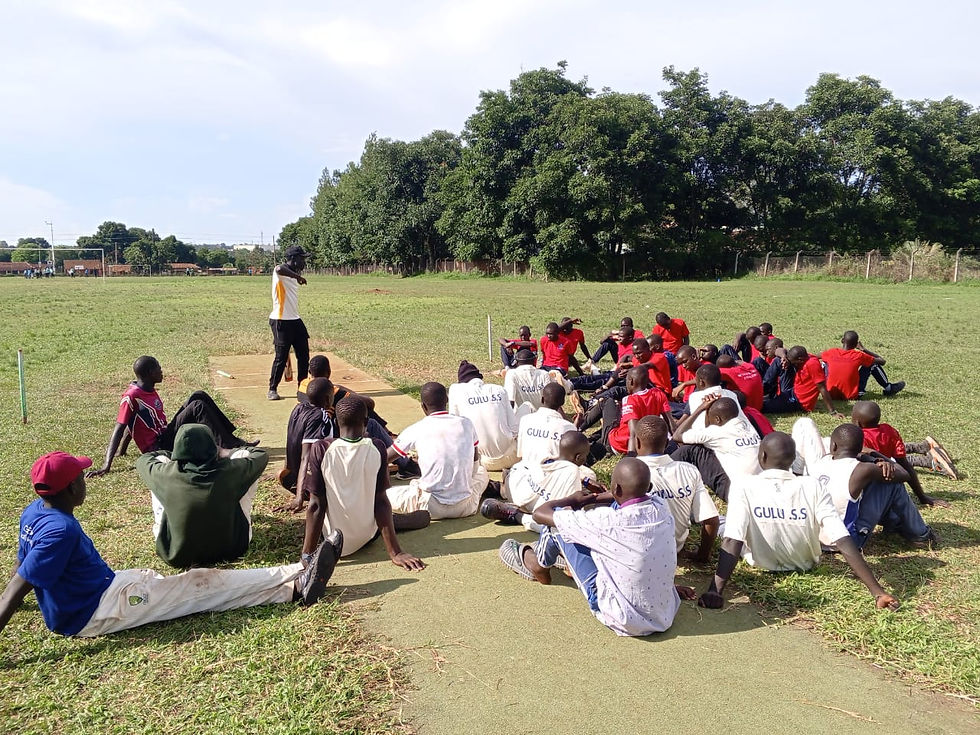 OCJC and Gulu SS receiving instruction during their match at Layibi College