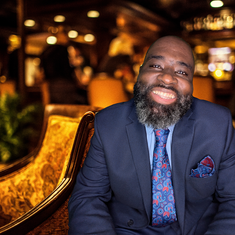 Smiling professional man in a suit for online music consulting