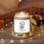 Thumbnail: Lit candle with floral label and fairy lights