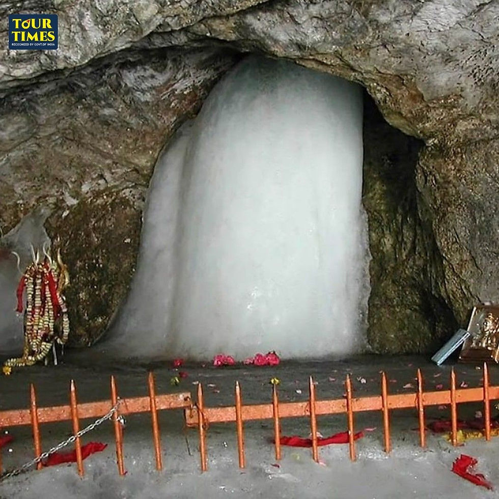 An icy stalagmite in a cave shrine, surrounded by red flowers and offerings. A protective fence is in the foreground. Tour Times logo.
Tour Times - Train Tours Premium Tourist Train Operators | Bharat Gaurav Train | Kasi Ayodhya | Cruise | Jyotirlinga | Divya Desam | International Tours | Europe Packages | Holidays | Yatras