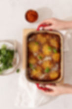 Placing the speedy eggplant parmigiana down on a kitchen bench