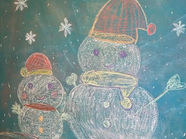 黒板の絵が雪だるまに