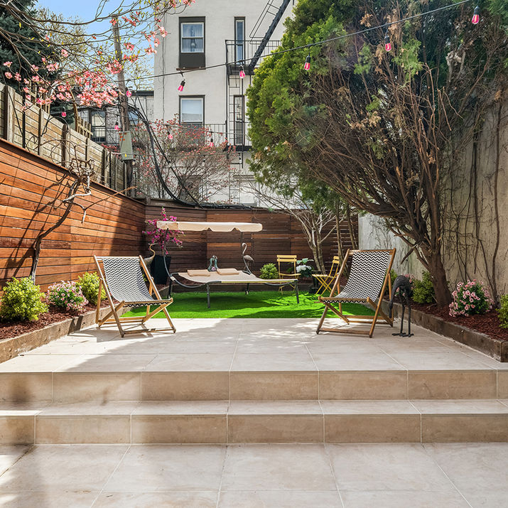 Luxurious new construction condominium or townhome at 38 Garfield Pl, Park Slope, Brooklyn, NY. The childhood home of Al Capone. The outdoor oasis is shown.
