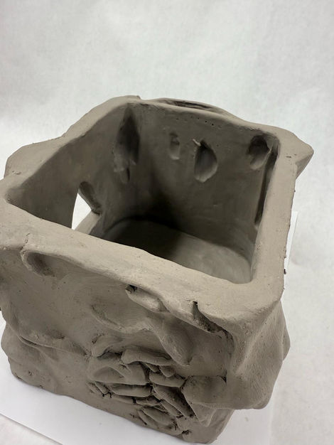 Scooped out a little bit of clay so it can dry out better!