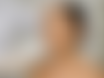 Woman receiving non-surgical facelift treatment in Singapore clinic with relaxed expression