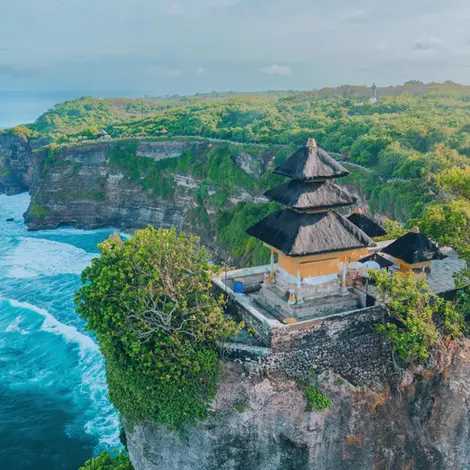 Uluwatu Temple on a cliff overlooking the Indian Ocean in Bali, Indonesia
