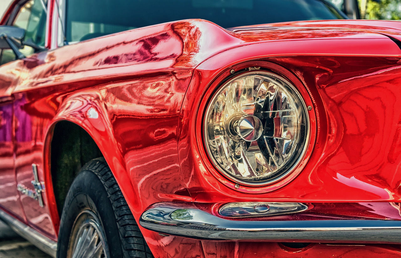 red mustang headlight classic car up close