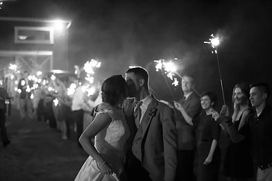 Bride and groom sparkler exit at their wedding reception at The Barn at Klines Mill