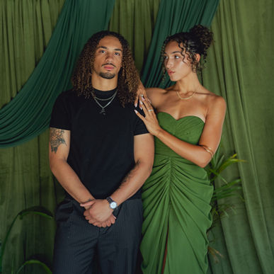 Models posing for a couple photo in a editorial style photobooth
