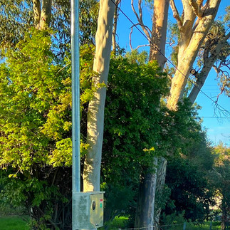 New galvanised steel private power pole installed in Perth during a private power pole replacement p