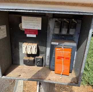 Existing pole-mounted electrical equipment inspected before replacement following a Western Power de