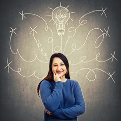 Entrepreneur with a light bulb, symbolizing business development for small business owners with a day job