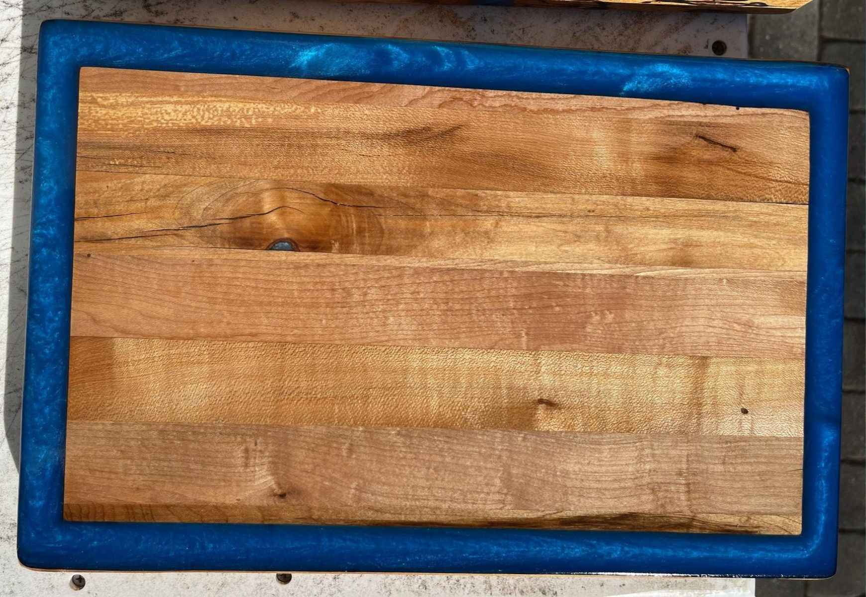 Cutting board with epoxy outline