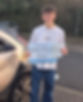 boy holding his pass certificate for driving