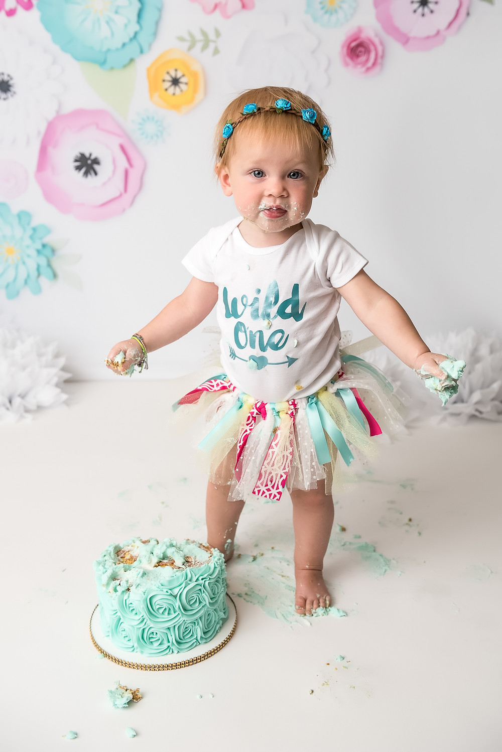 Long Island cake smash for 1st birthday baby girl with pink and aqua flowers