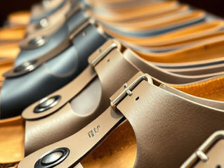 Birkenstock sandals lined up on a shelf