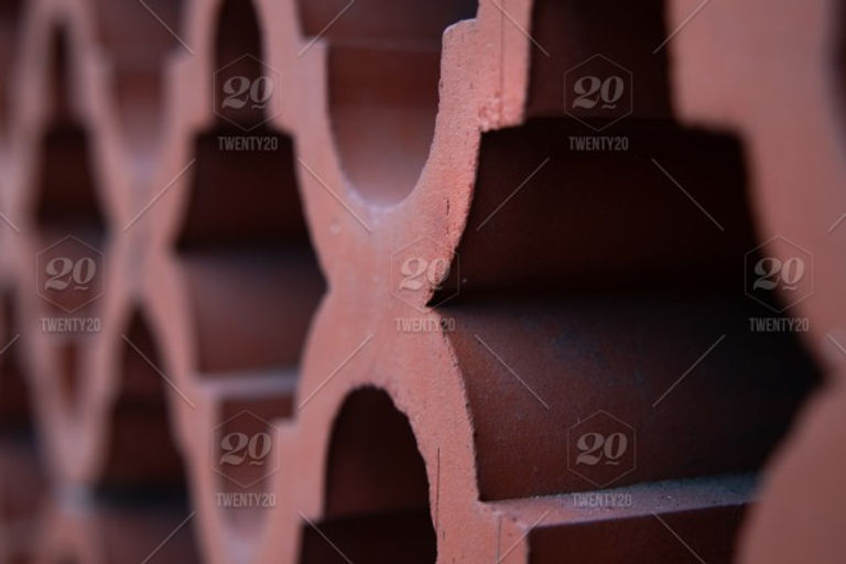 stock-photo-brown-wall-brick-close-up-abstract-decor-texture-detail-geometric-70284624-385
