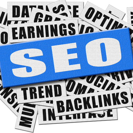 SEO stacked on top of newspaper clippings