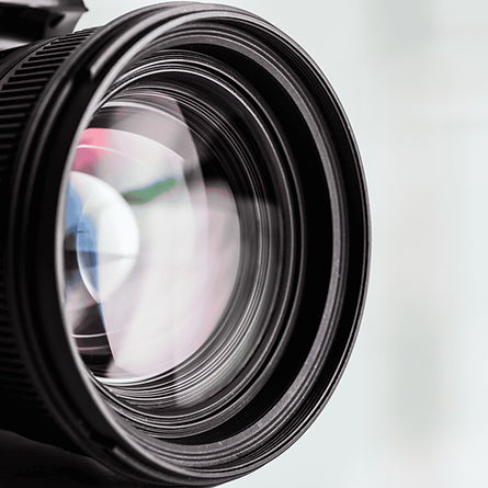 A camera lens exhibiting media production services
