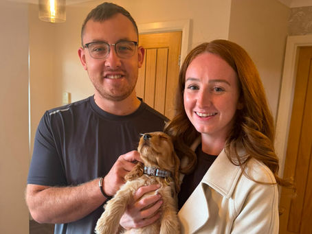 Bear with Becky and Jonny, ready to begin his new life alongside fellow Greavesamor Cocker Spaniel, Buzz.