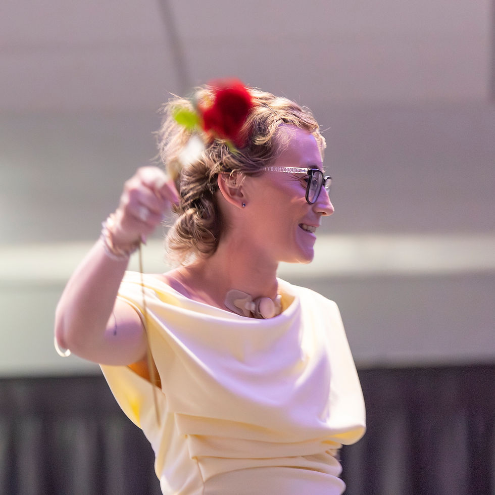 Photo of head and neck cancer patient during a fashion show