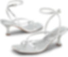 Silver strappy high-heeled sandals with ankle straps, featuring sleek design on a plain white background. Fashionable and elegant.