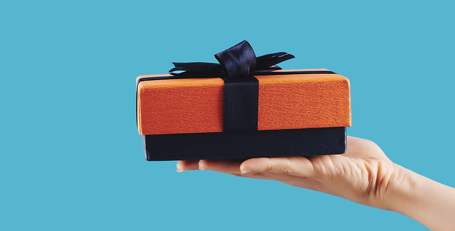 small-gift-hand-person_edited.jpg