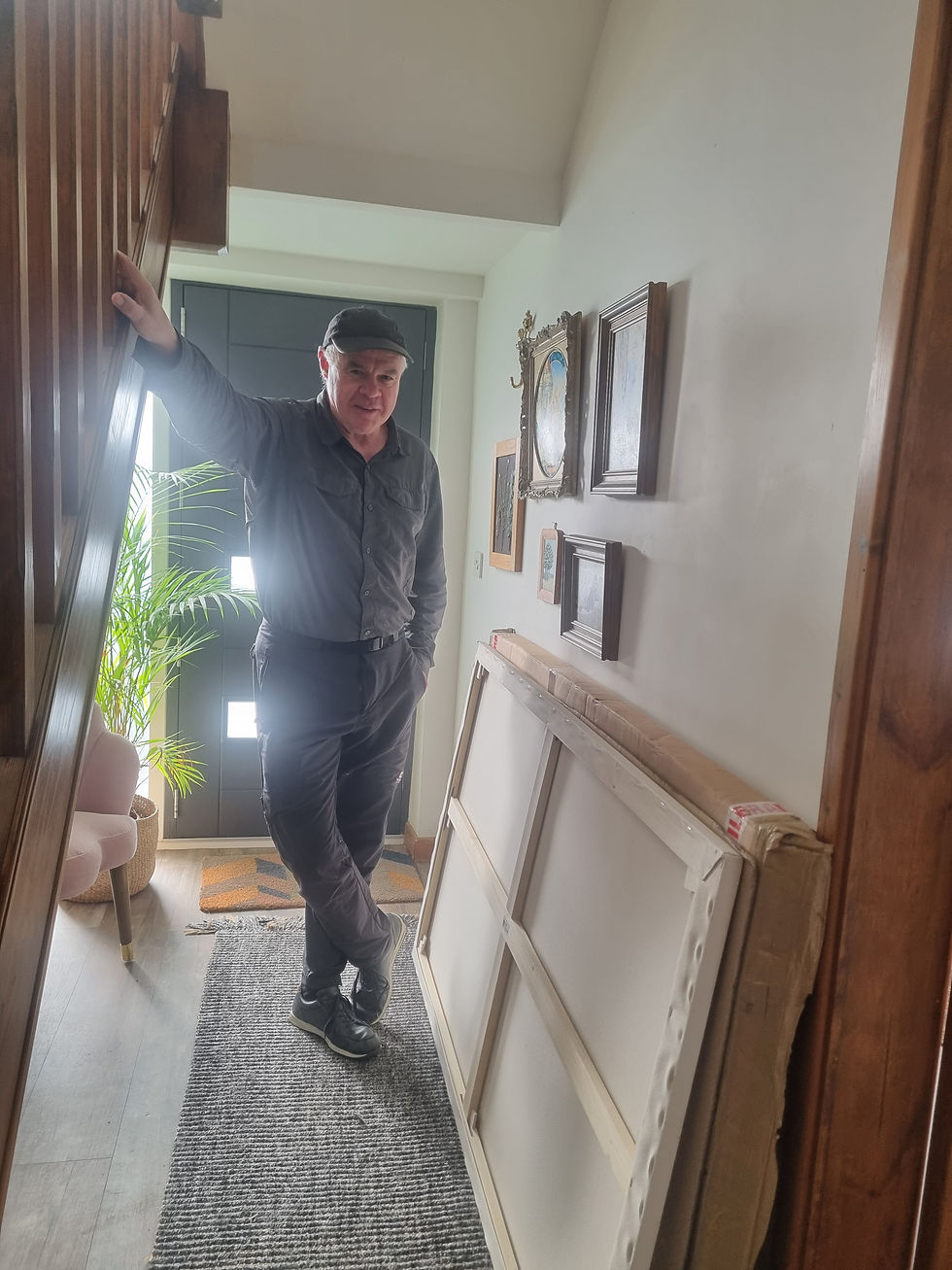 Graham Twyford, Lake District Artist, with a large canvas