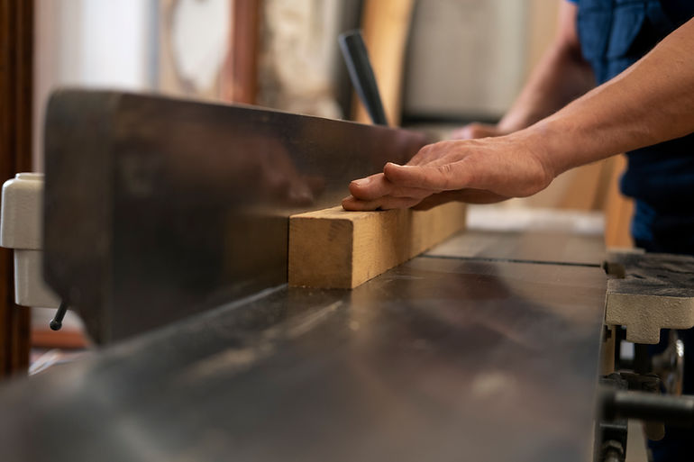 man-working-his-wood-shop-with-tools-equipment.jpg