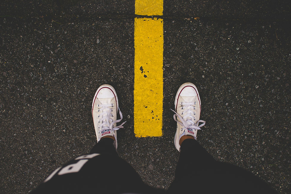 Pause and bring your attention down into the soles of your feet.