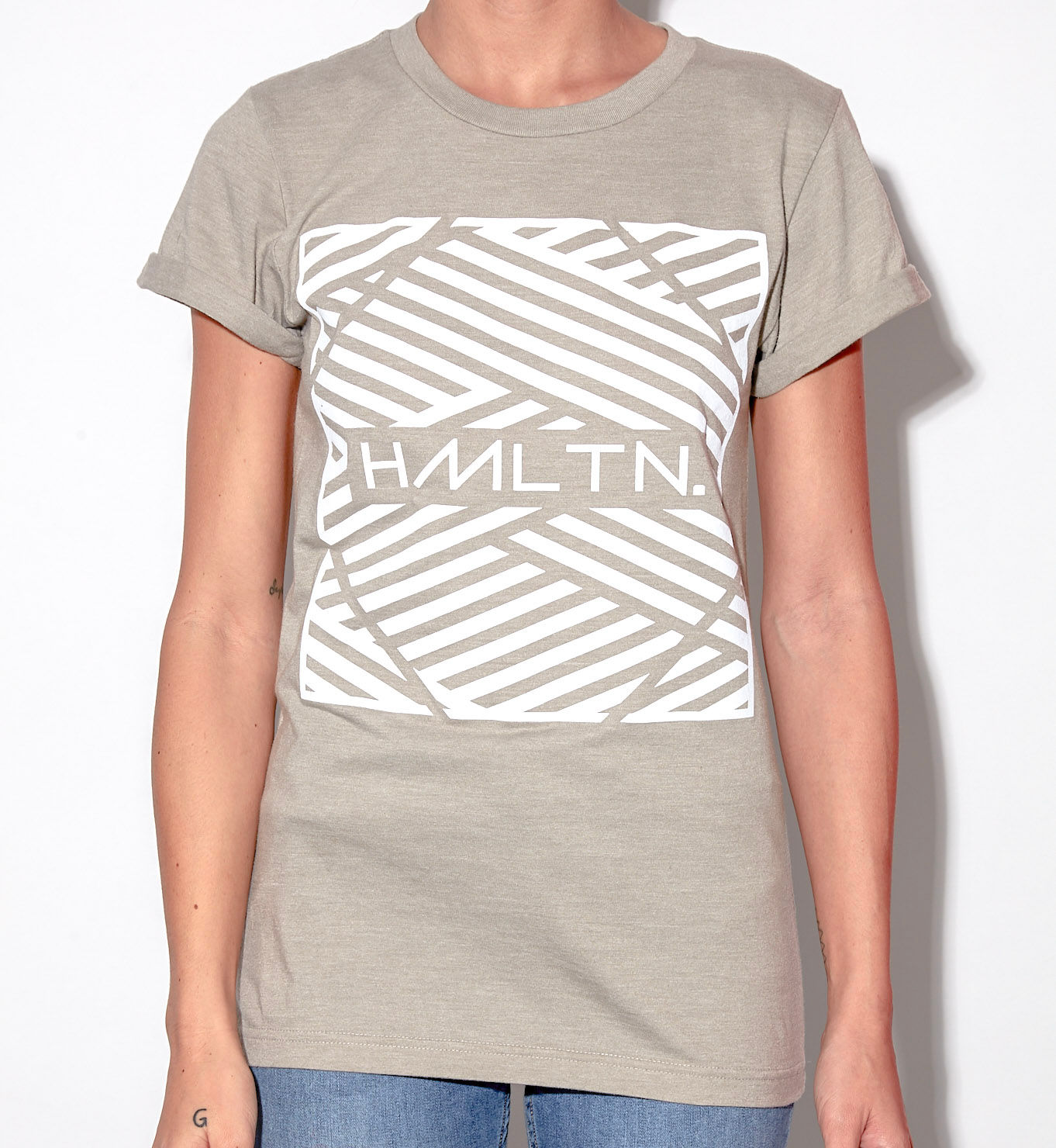 front view of model wearing zig - zag rolled cuff tee in stone grey hollywood hamilton clothing