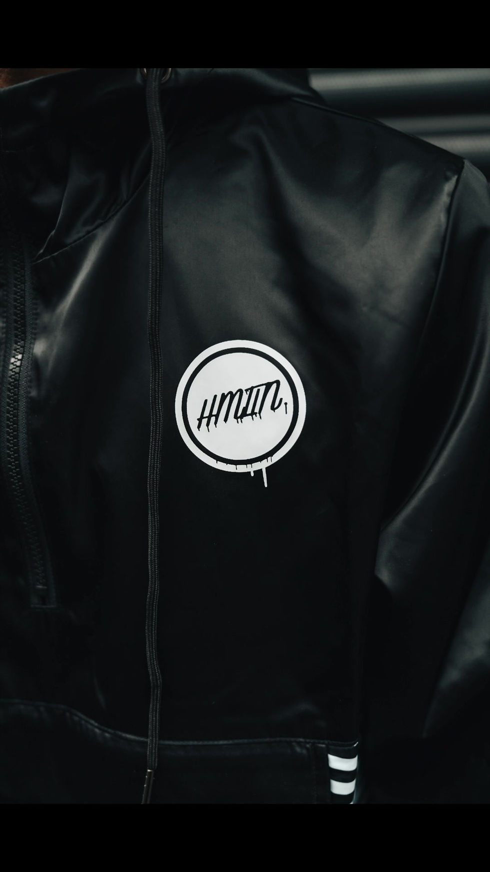 Thumbnail: Bomerang close up of Hollywood Hamilton Clothing HMLTN graffiti chest logo