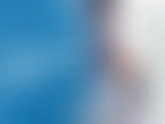 Man thoughtfully looking at computer screen