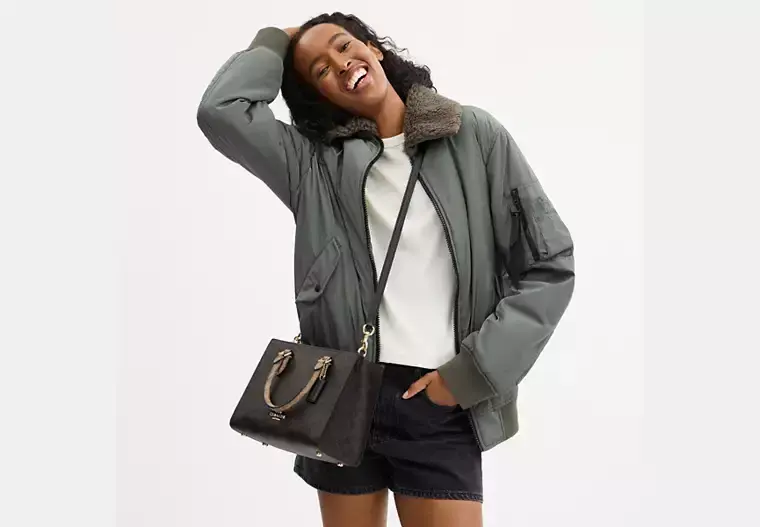 Thumbnail: Maggie Small Tote Bag In Blocked Signature Canvas