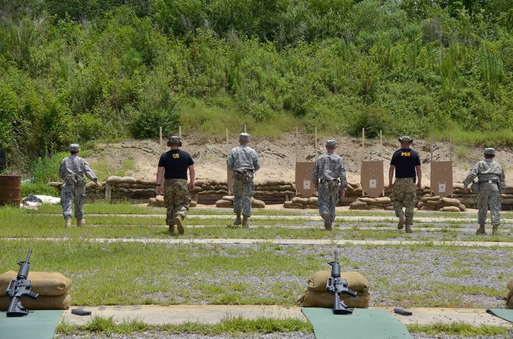 Marksmanship range with targets and instructors at Camp Liberty