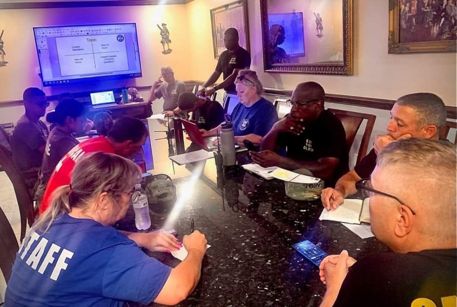 Group meeting inside the Camp Liberty Wardroom