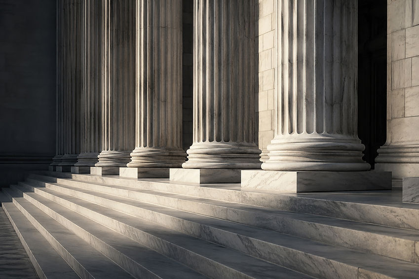 A clean editorial-inspired architectural view of courthouse-style marble steps and monumen