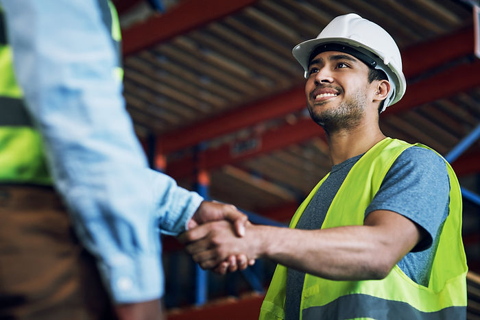 Happy man, architect and handshake for construction, building or hiring in teamwork or par