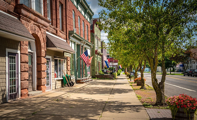 Main street U. S.A. store fronts on a summer day in a small town...jpg