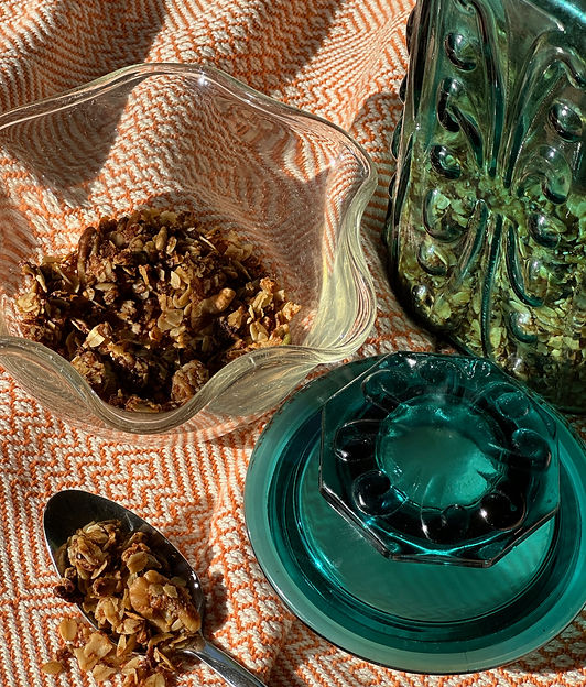 My grandpa's granola in a vintage blue glass jar