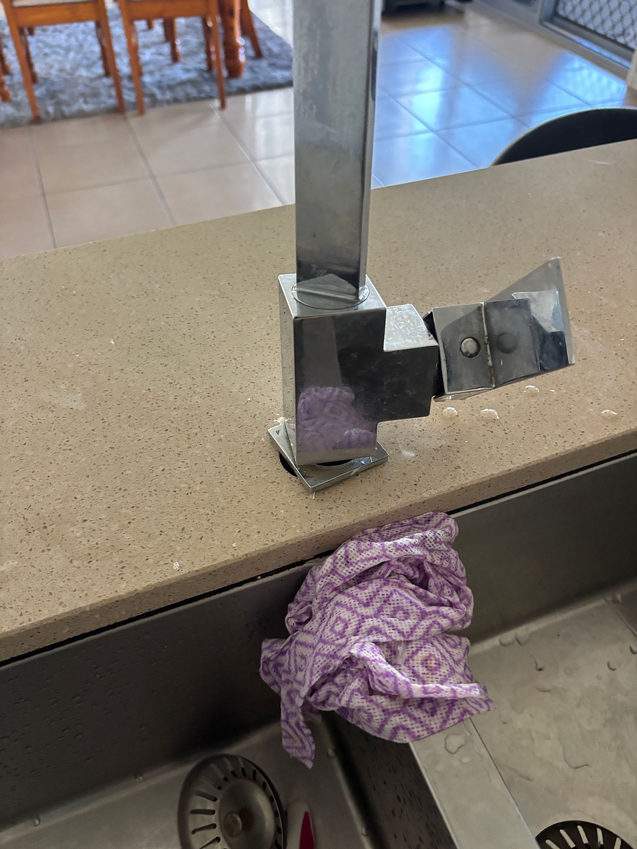 kitchen sink mixer has become loose on the benchtop