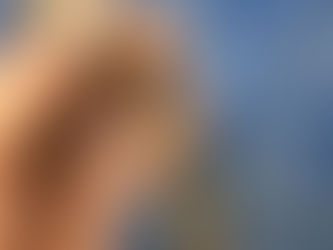 Close-up of a severely corroded braided flexible water hose with a ruptured section, showing rust damage that caused the hose to burst and flood the property.